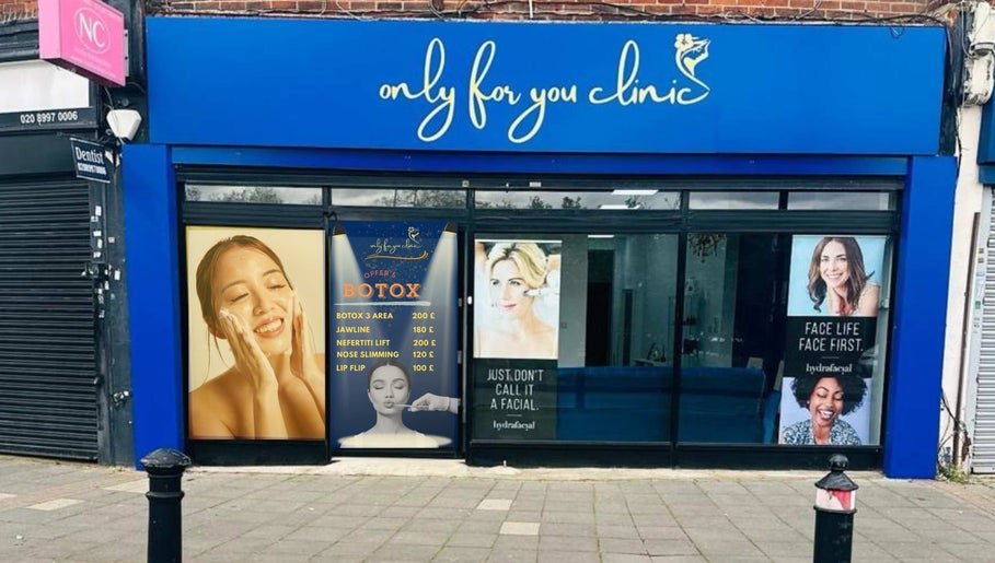 Exterior of Only For You Clinic in Perivale, England, GB showcasing beauty service posters.