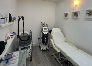 Modern treatment room at Only For You Clinic in Perivale, England, GB, featuring a comfortable treatment chair.