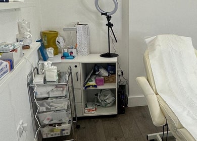 Treatment room at Only For You Clinic, Perivale, England, GB, with equipment and a comfortable chair.
