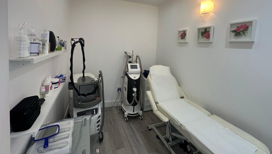 Modern treatment room at Only For You Clinic, Perivale, England, GB, showcasing sleek equipment and serene decor.