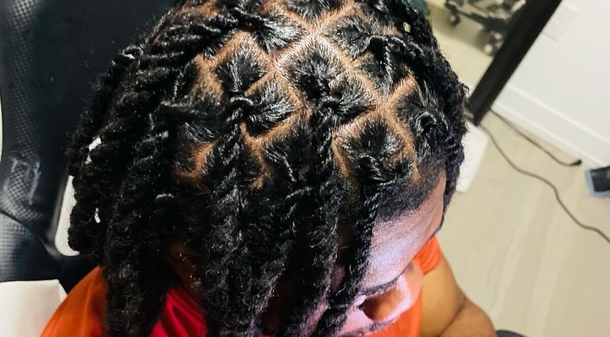 Stylish locs hairstyle at Chindo Locs in Toronto, Ontario, CA, showcasing intricate hair design.