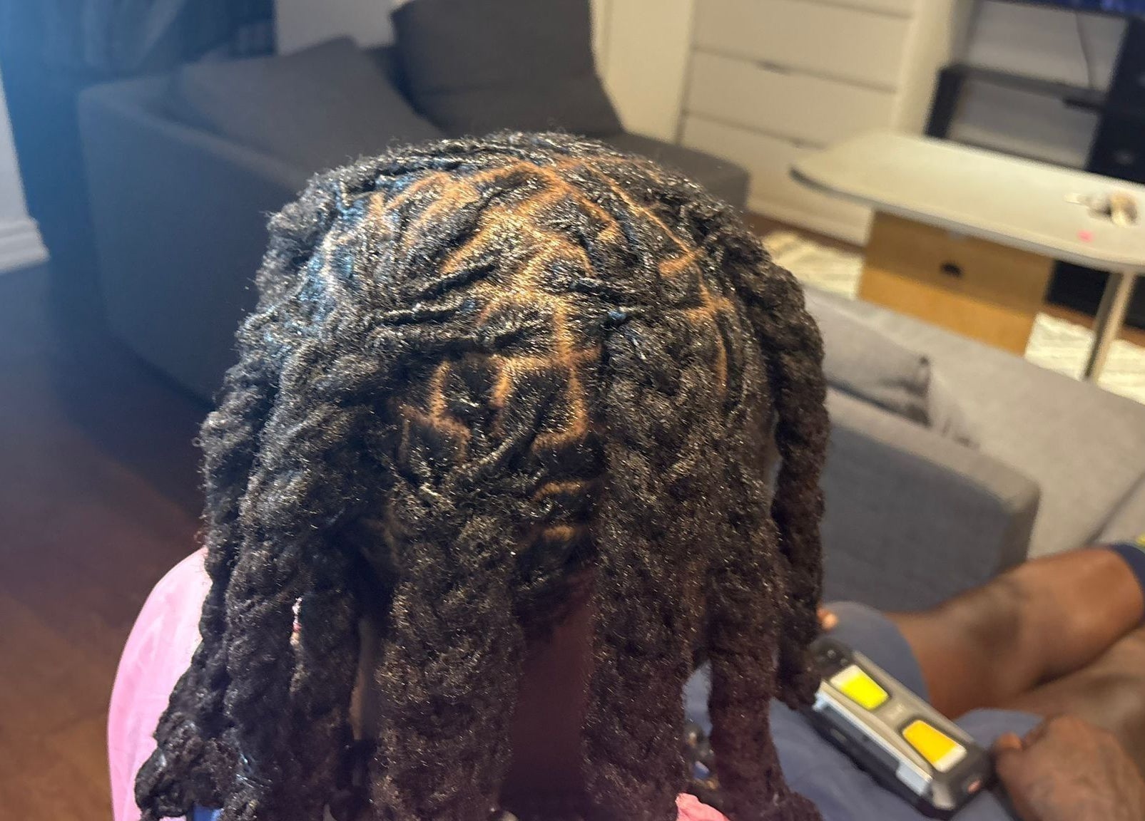 Beautiful locs styled at Chindo Locs in Toronto, Ontario, CA, showcasing expert hair design.
