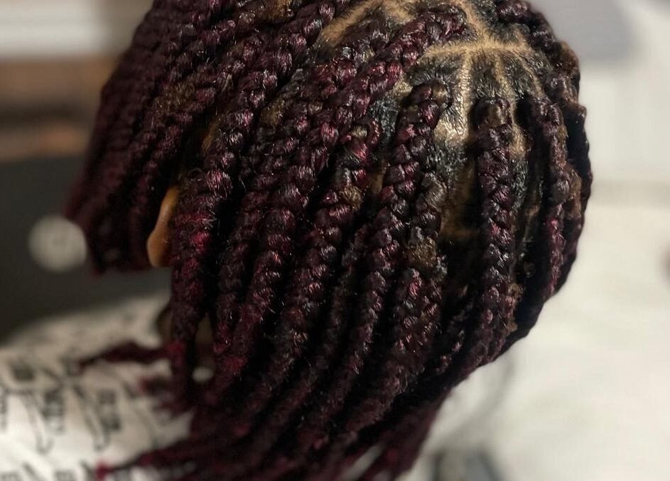 Close-up of intricate braided hairstyle at Chindo Locs, Toronto, Ontario, CA, showcasing detailed craftsmanship.