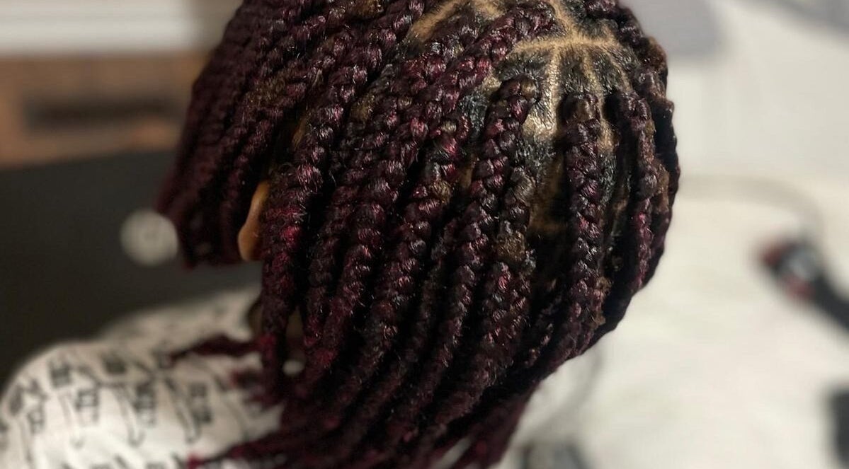 Close-up of intricate braided hairstyle at Chindo Locs, Toronto, Ontario, CA, showcasing detailed craftsmanship.