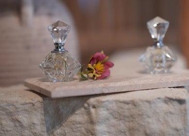 Elegant glass bottles with flower at السلمانية الجنوبيه, Al Hofuf, Eastern Province, SA.