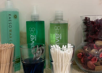 Beauty essentials at USA Star Beauty, London, England, GB showcase wax, cotton, and decorative elements.