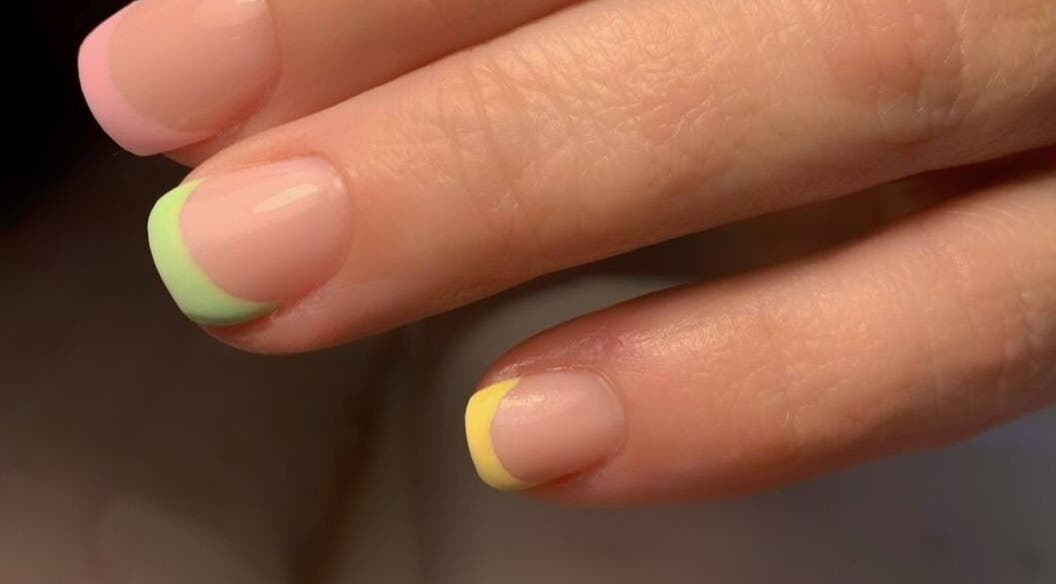 Colorful French manicure at Vicky’s Nails in Gendros, Wales, GB.