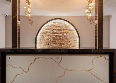 Luxurious reception at Wellness 360 Spa At Hotel Retlaw in Fond Du Lac, Wisconsin, US, highlighted by modern design.