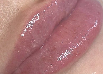 Close-up of glossy lips treatment at Resculpt Aesthetics, Fareham, England, GB showcasing a refined finish.