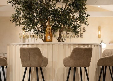 Elegant lounge at Ramona Cicortas in Telford, England featuring chic seating and decor.