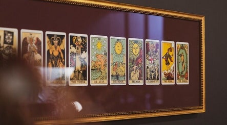 Framed tarot cards at Lune Noire, Ir-rabat Għawdex, MT, offering a mystical vibe.