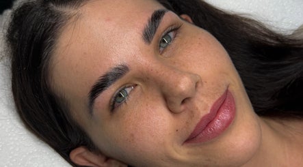 Close-up of well-groomed brows and skin at Arch Aesthetic, Palm Beach, Queensland, AU.