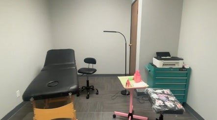 Tattoo studio at Shade Tattoos in Thornton, Colorado, US with a modern table and equipment.