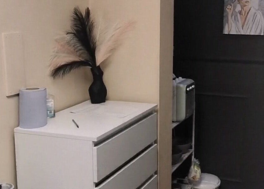 Chic interior decor at Easy Silhouette, Peterborough, England, GB featuring a sleek cabinet and stylish vase.