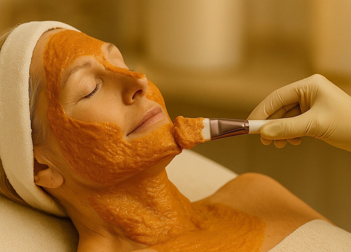 Woman enjoys facial mask at D&K Medical Esthetics, Grimsby, Ontario, CA for rejuvenation.