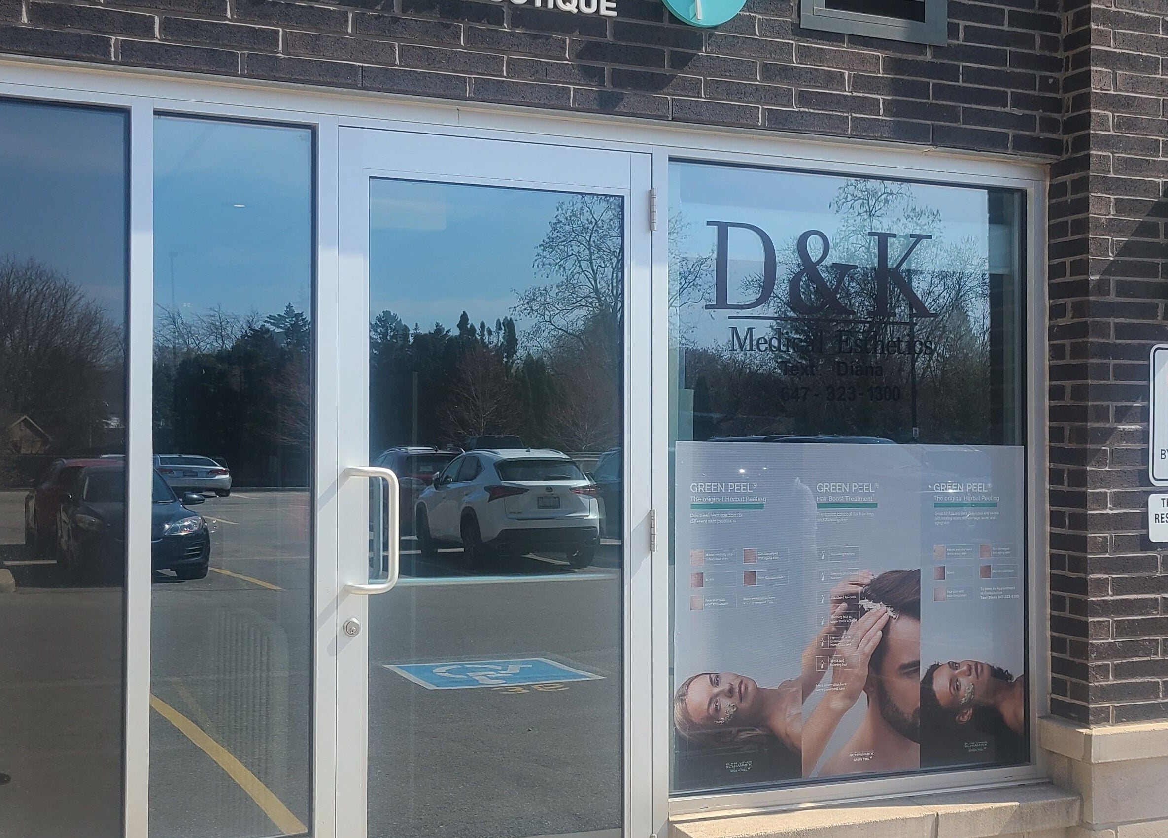 Front entrance of D&K Medical Esthetics, Grimsby, Ontario, CA featuring glass doors and signage.