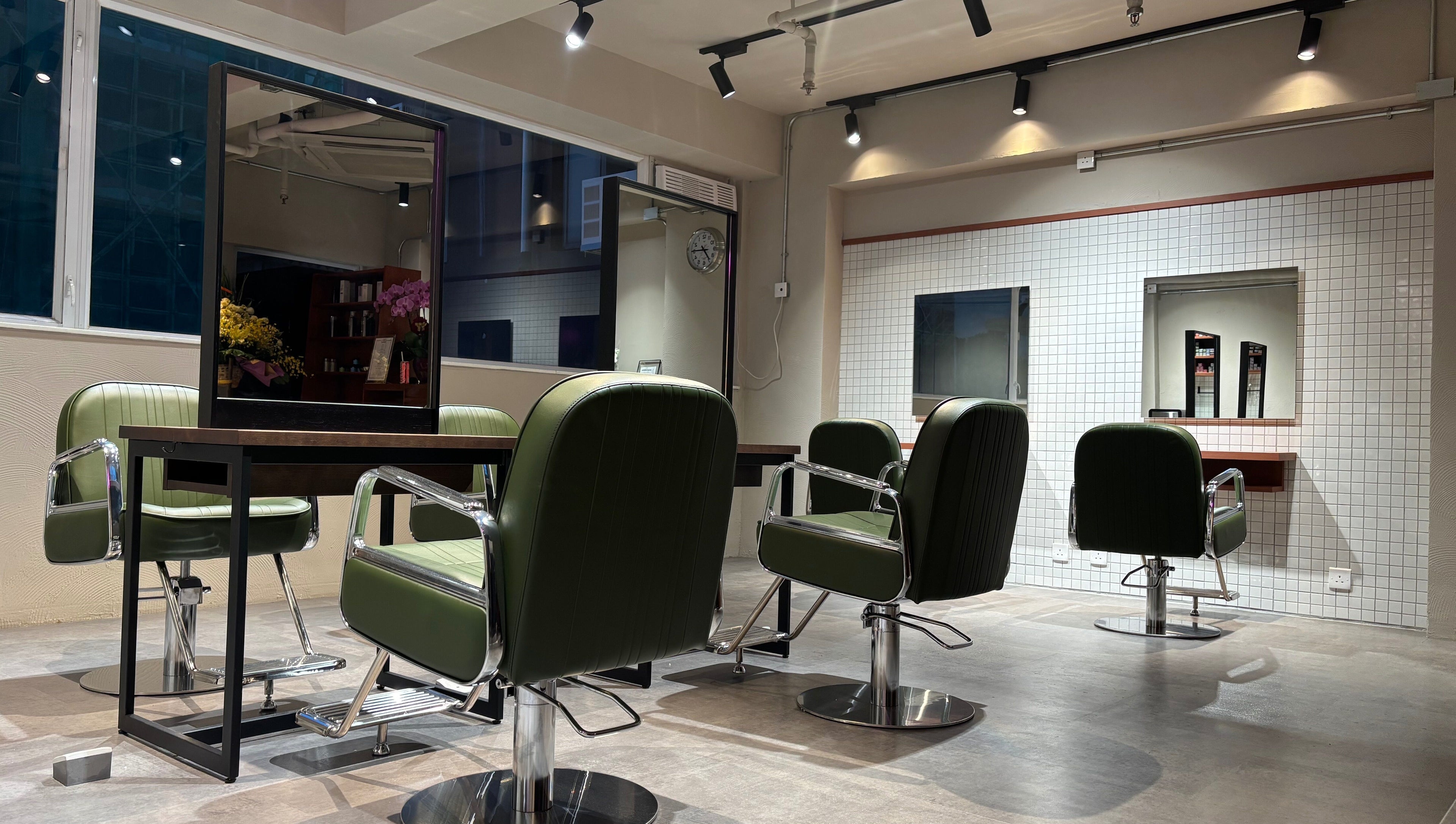 Modern styling chairs at PEACH Japanese Hair Salon, Hong Kong Island, HK, reflecting contemporary elegance.
