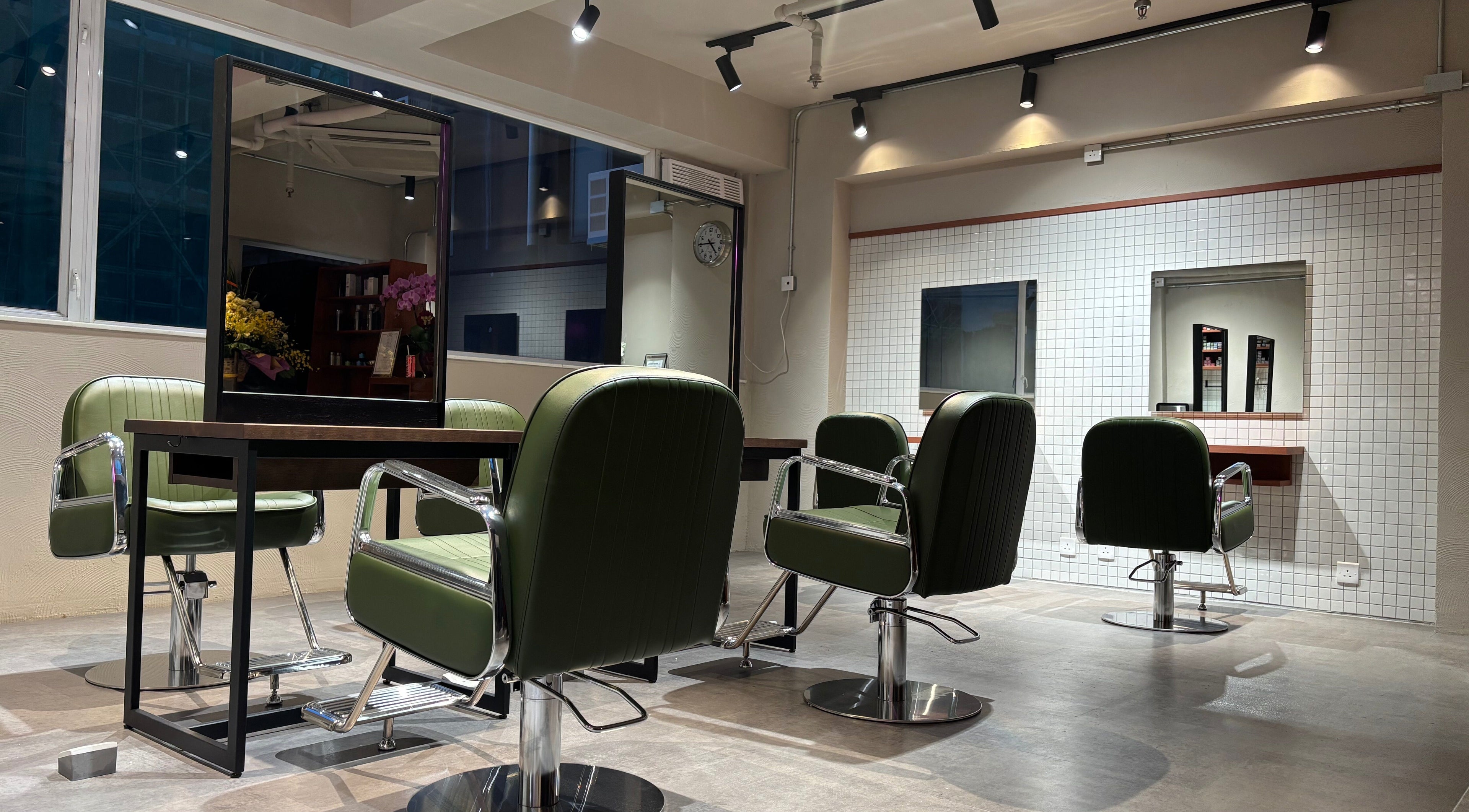Modern styling chairs at PEACH Japanese Hair Salon, Hong Kong Island, HK, reflecting contemporary elegance.