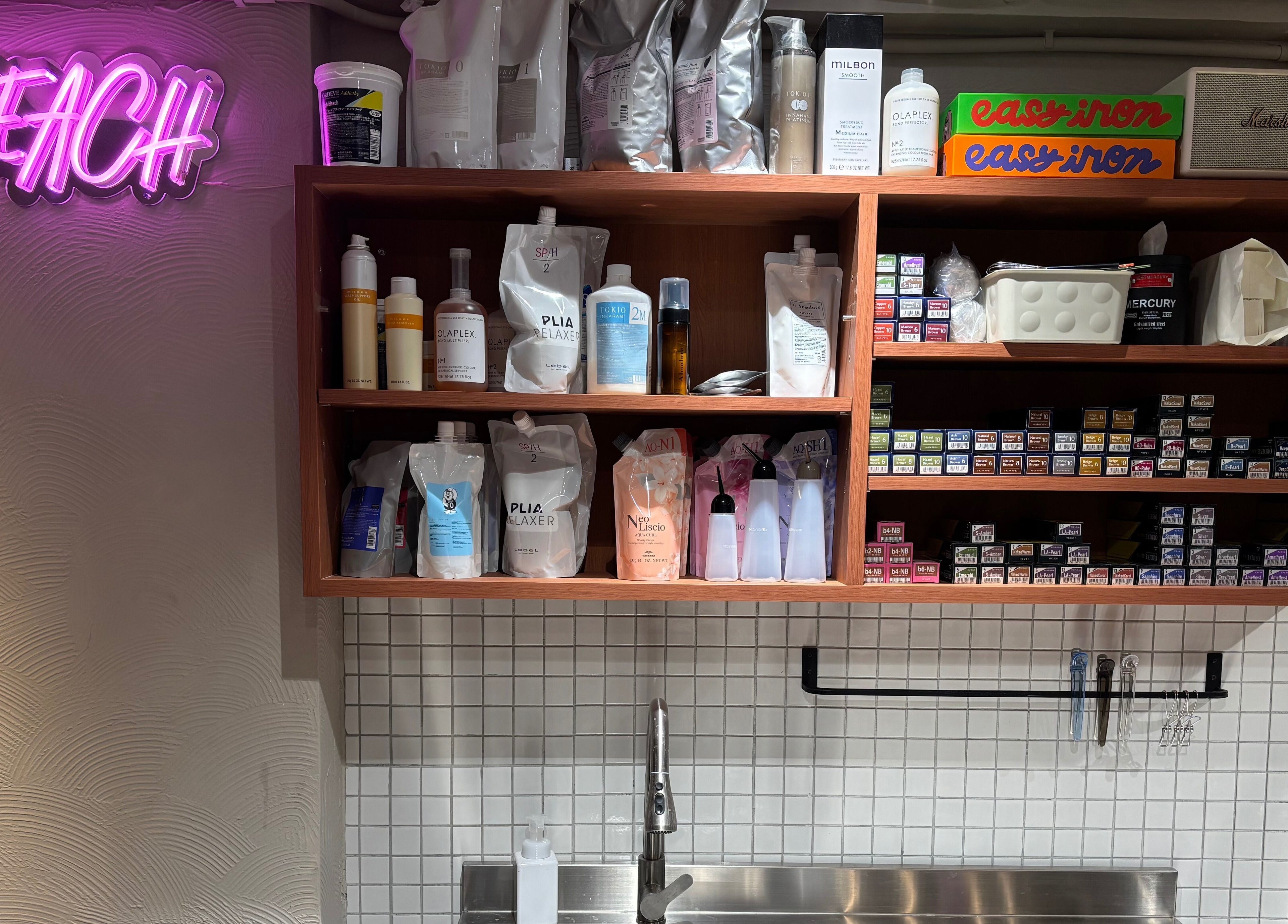 PEACH Japanese Hair Salon's stocked shelves of hair products on Hong Kong Island, Hong Kong Island, HK.