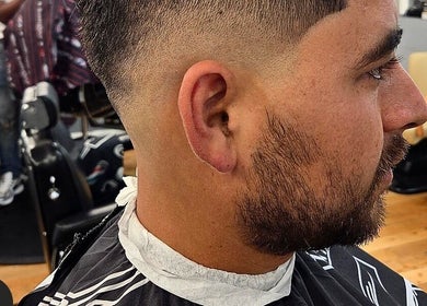Cliente satisfecho con corte fade en Michael Barbers, Gaithersburg, Maryland, US.