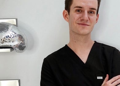 Nurse in uniform at JEI Clinic, Randwick, New South Wales, AU offers professional beauty services.