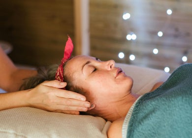 Relaxing therapy at SMENA Healing Studio, Melbourne, Victoria, AU with a serene ambiance and gentle touch.