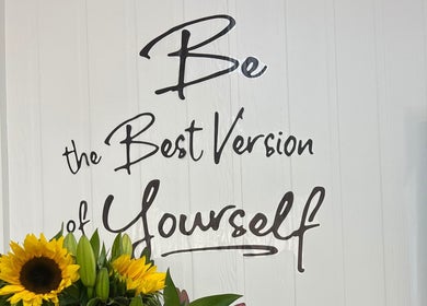 Motivational quote 'Be the Best Version of Yourself' with sunflowers at JA Pro Beauty, Bundaberg West, Queensland, AU.