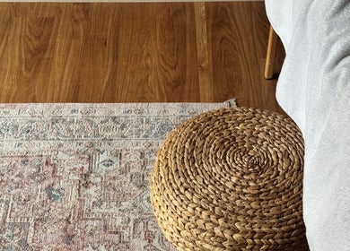 Elegant wicker basket and patterned rug at The Soul Co - (Women Only) - Walsall, England, GB.