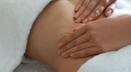 Therapist performs a soothing massage at The Soul Co at Curlita Beauty, Stafford, England, GB.