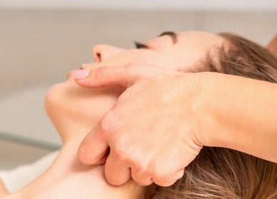 Gentle neck massage at The Soul Co at Curlita Beauty, Stafford, England, GB, promoting relaxation and wellness.