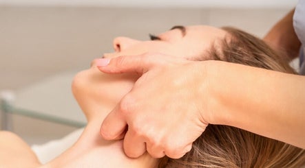 Gentle neck massage at The Soul Co at Curlita Beauty, Stafford, England, GB, promoting relaxation and wellness.