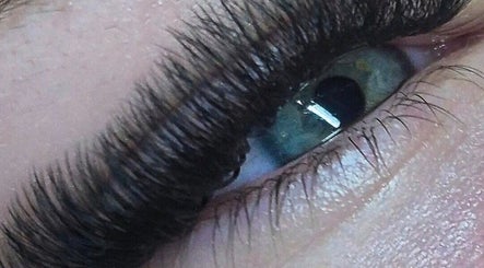 Close-up of lush eyelash extensions at Oliviabeautè, Eastbourne, England, GB, showcasing expert craftsmanship.