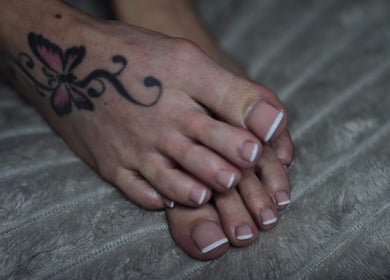 French pedicure and butterfly tattoo at Oliviabeautè, Eastbourne, England, GB.