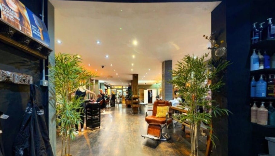 Elegant interior of Jo Gulliford Hairstylist in Brighton And Hove, GB, showcasing a stylish and vibrant salon atmosphere.