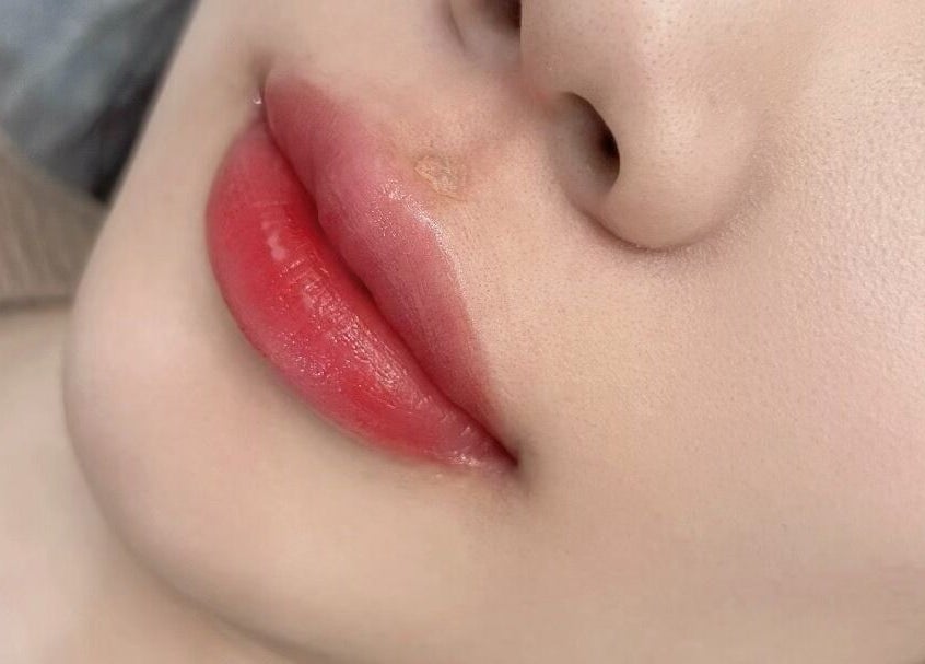 Close-up of red lips showcasing beauty at Luna Beauty Melbourne, located in Melbourne, Victoria, AU.