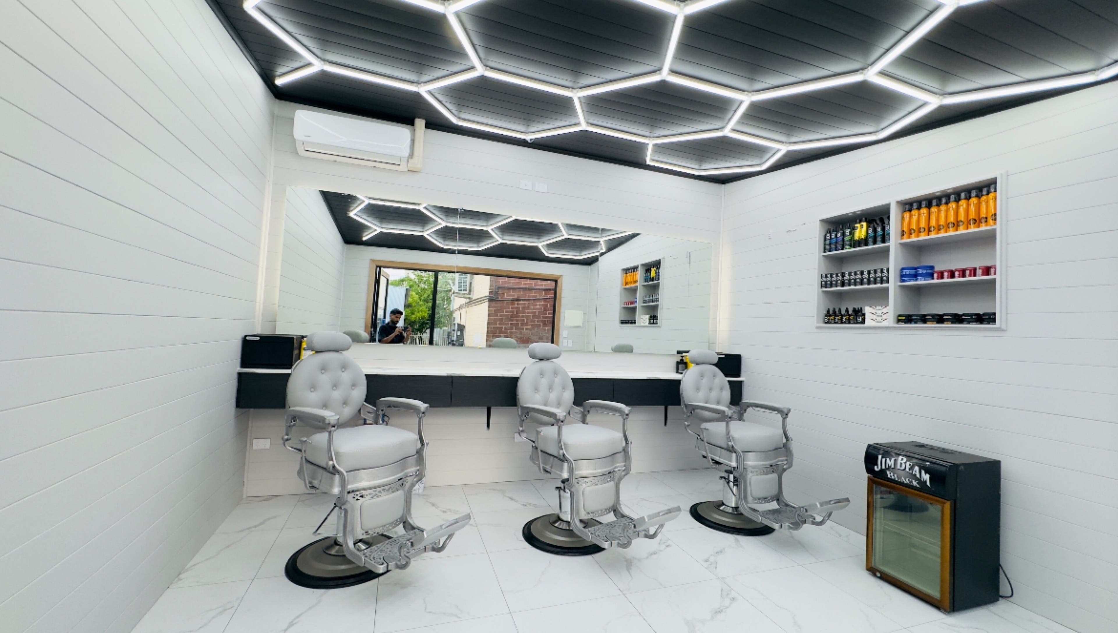 Modern barber chairs and stylish interior at Raz Fades, Croydon, South Australia, AU.