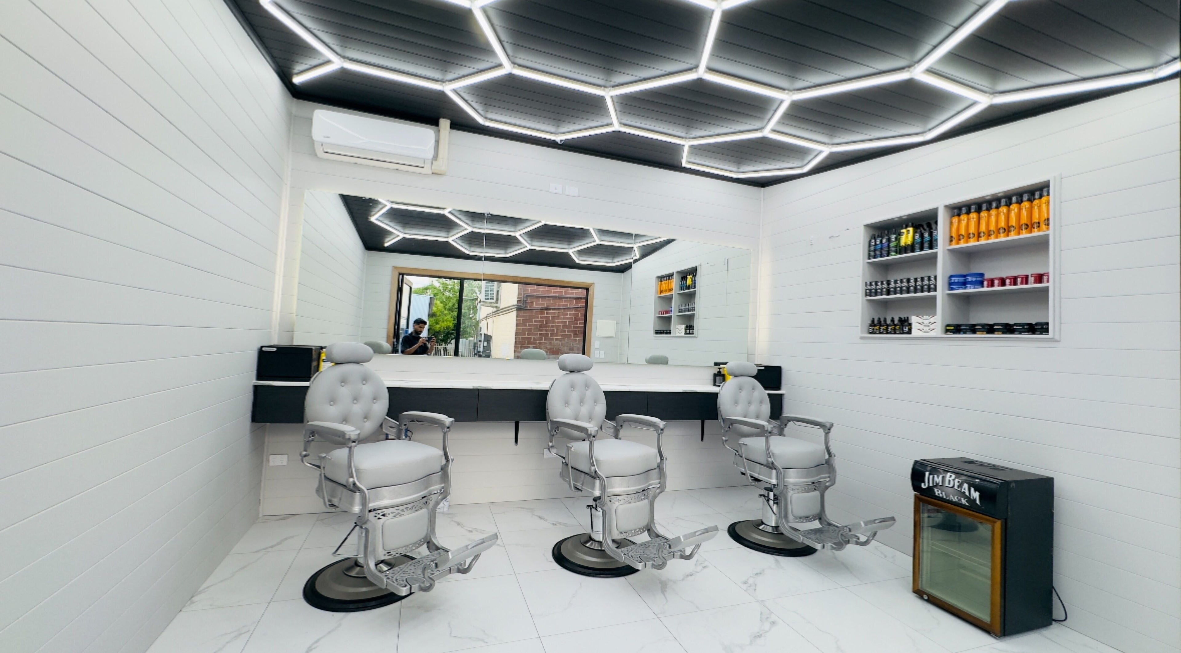 Modern barber chairs and stylish interior at Raz Fades, Croydon, South Australia, AU.
