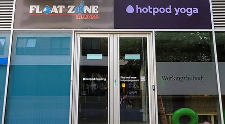 Entrance of Duo Soul Flow in Reading, England, GB showcasing bright signage and modern glass doors.