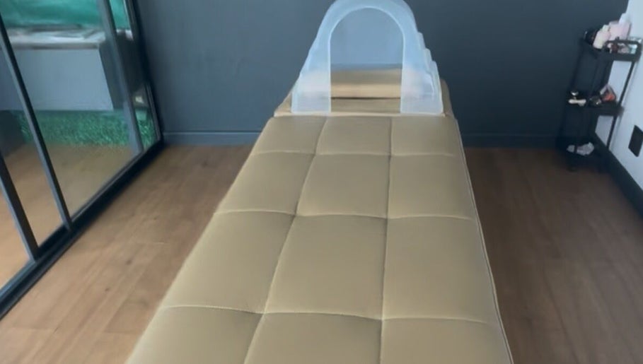 Tranquil massage room at The Peace Lab, Cape Town, Western Cape, ZA, featuring comfortable massage table.