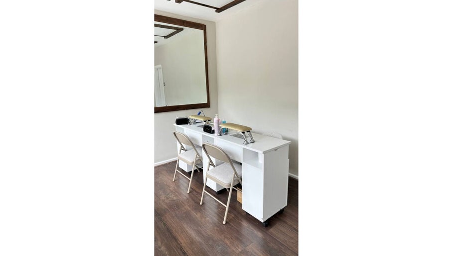 Stylish interior of Irlam Nail Studio in Irlam, England, GB with sleek nail stations and elegant decor.