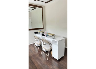 Stylish interior of Irlam Nail Studio in Irlam, England, GB with sleek nail stations and elegant decor.