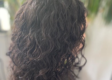 Beautiful wavy hairstyle created at Blended Hair & Wellness, Hounslow, England, GB.