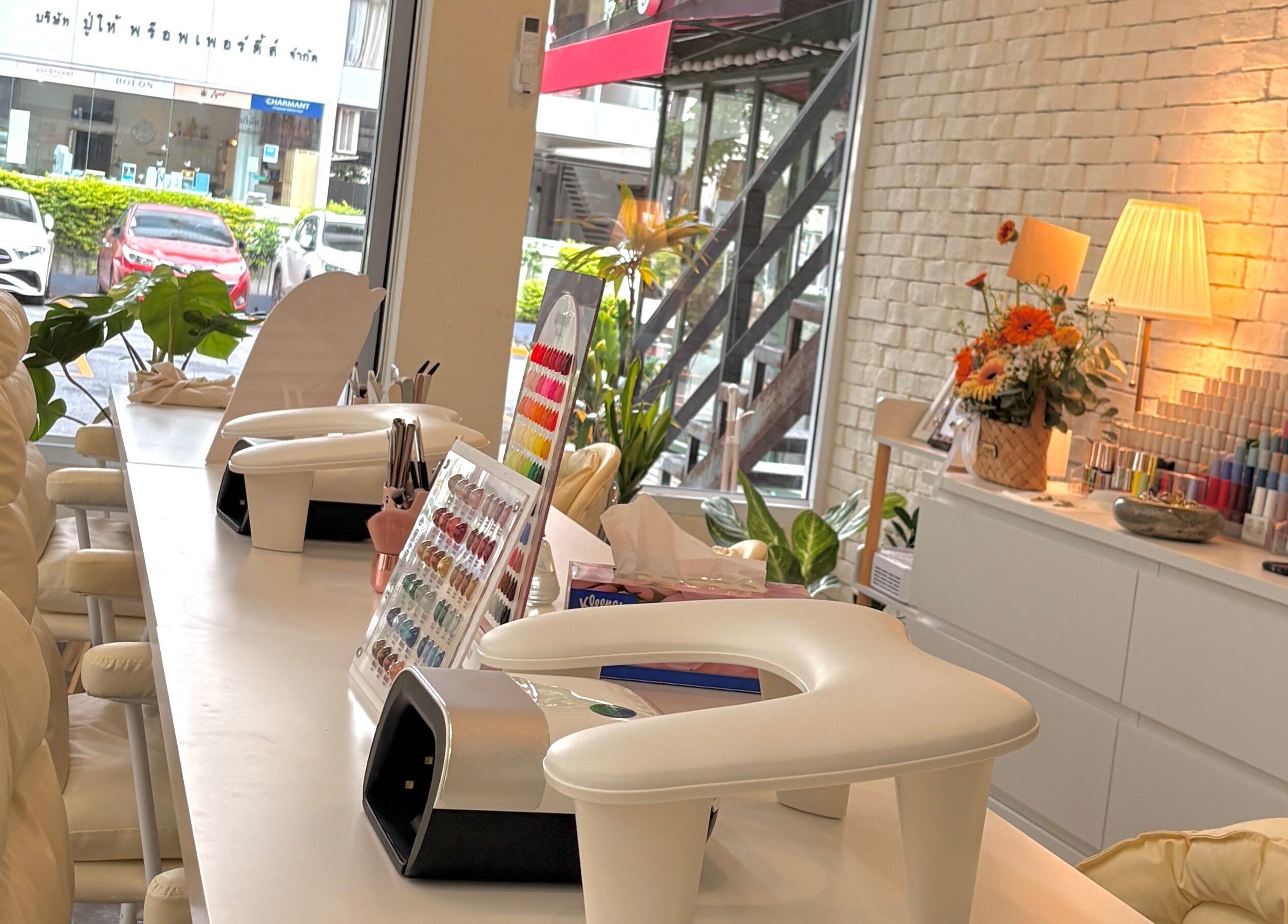 Modern nail studio at YIN Nails and Lashes, Krung Thep Maha Nakhon, with elegant decor and manicure tools.