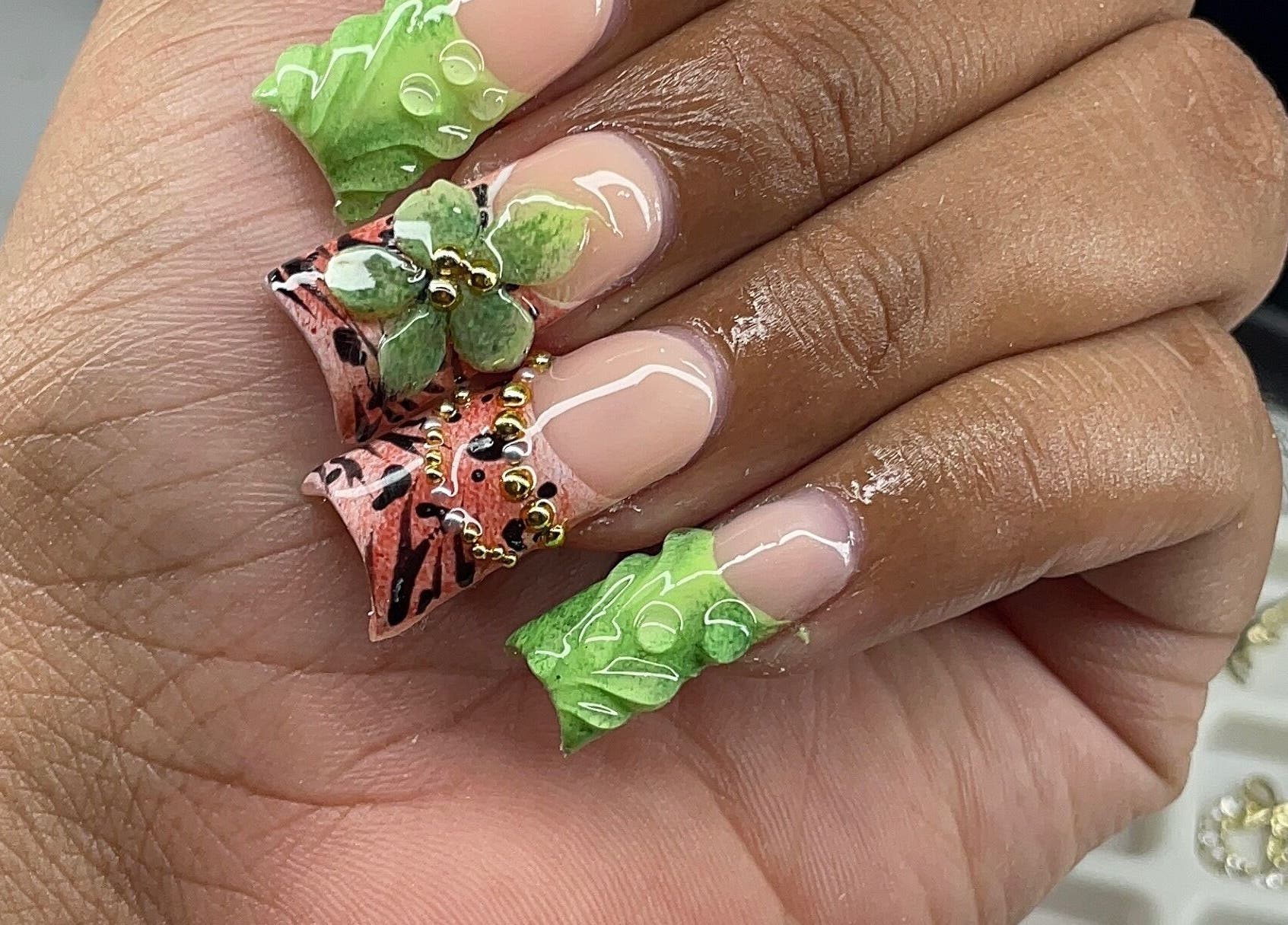 Vibrant tropical nail art at Pretty in Polygel, Portsmouth, Saint John Parish, DM.