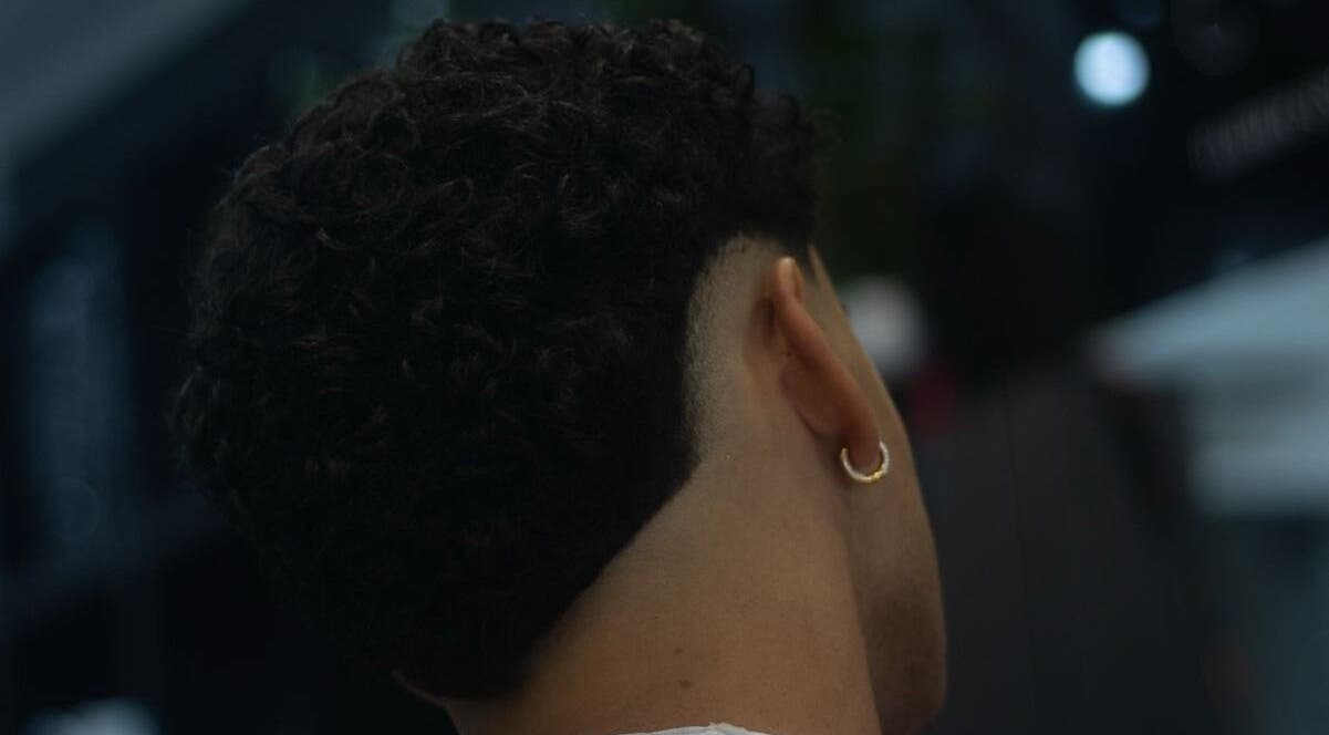 Fresh curly hairstyle at Alberto's salon in Gzira, MT showcasing expert grooming and modern style.