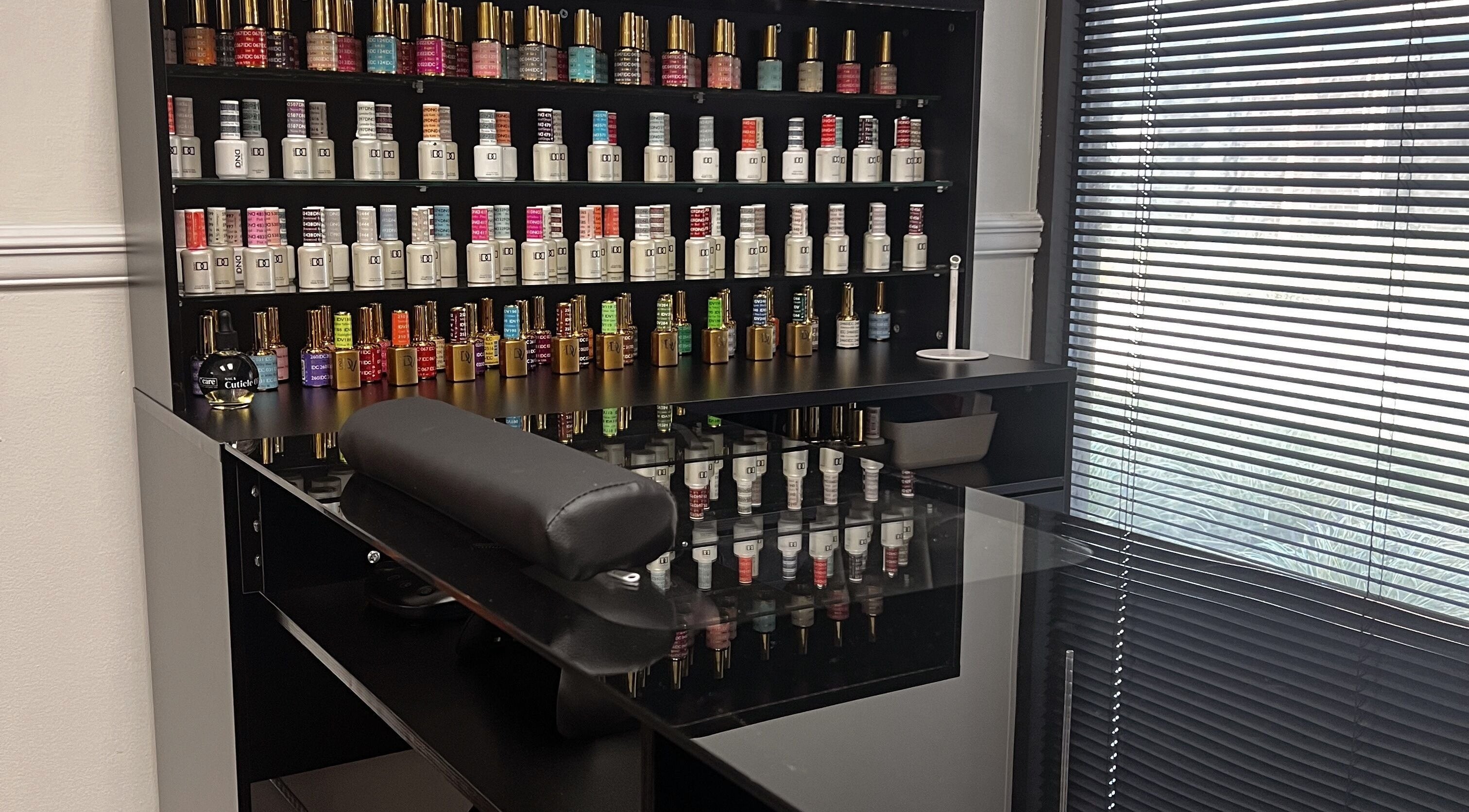 Nail polish display at MattiBBeauty at Penny Lane, Rome, Georgia, US showcasing a wide color range.