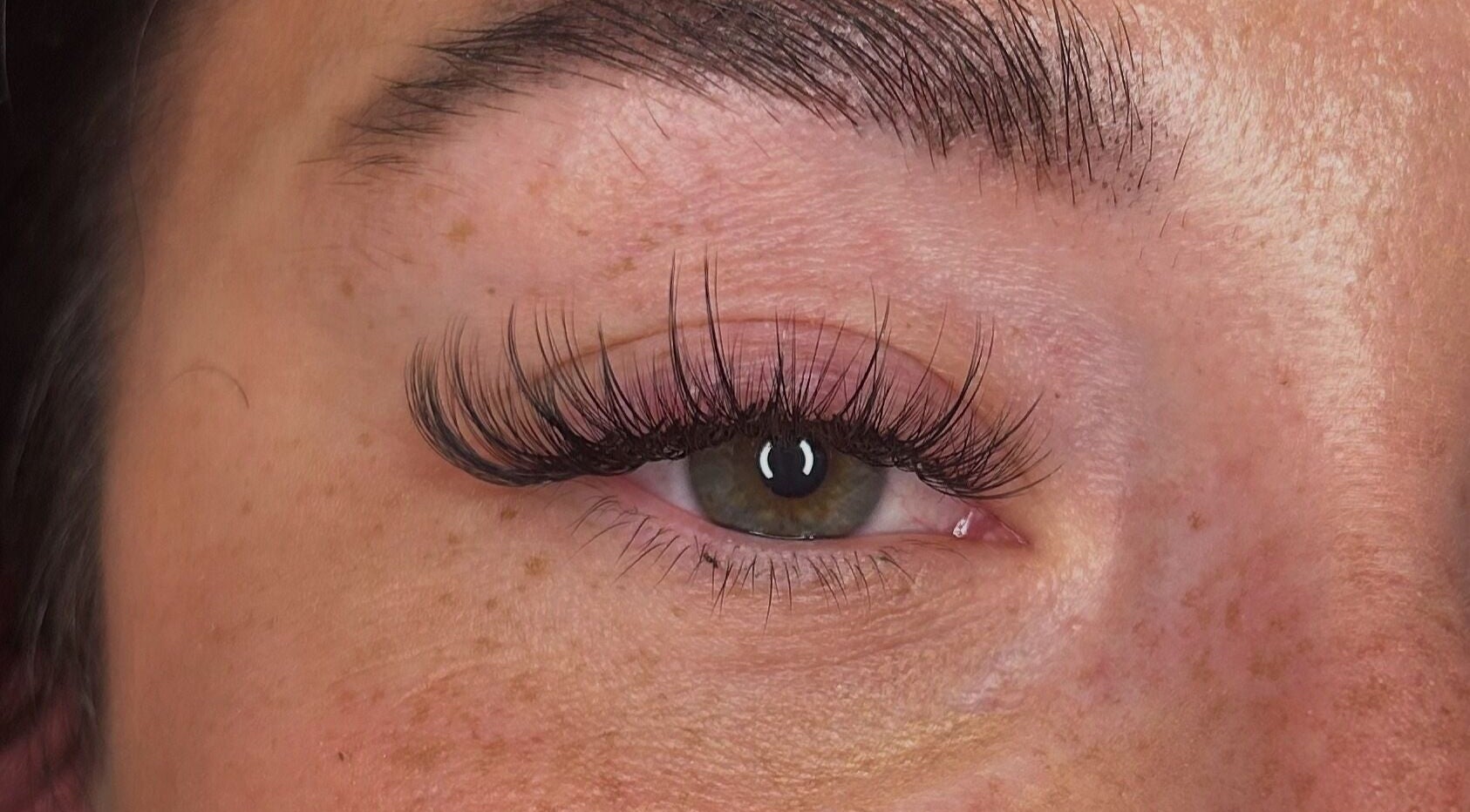 Close-up of intricate eyelash extensions at BB Lashes, Sheffield, England, GB. Natural and detailed lash artistry.