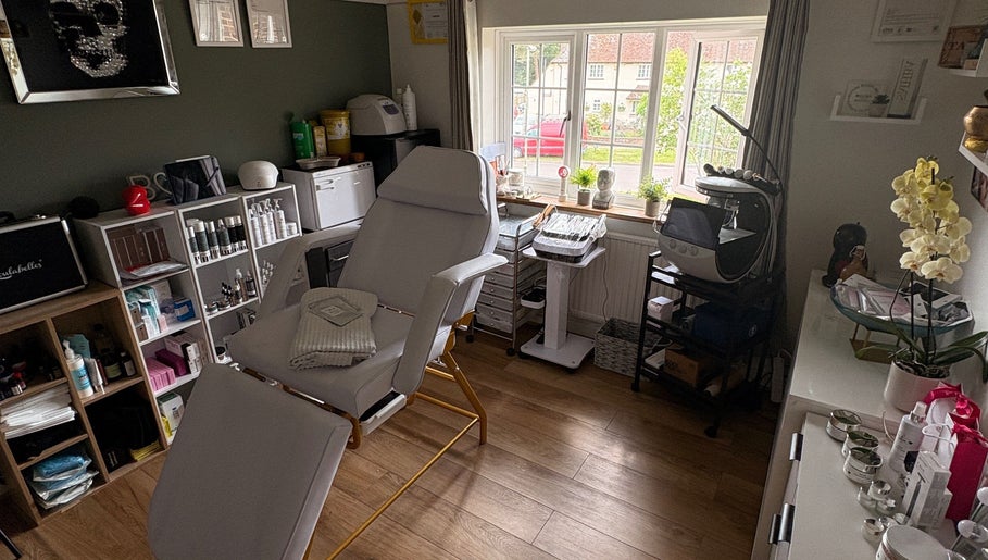 Calm treatment room at SARAH HUNT | SKIN SPECIALIST, Cranleigh, England, GB featuring modern skincare equipment.