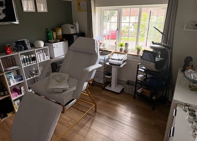 Calm treatment room at SARAH HUNT | SKIN SPECIALIST, Cranleigh, England, GB featuring modern skincare equipment.