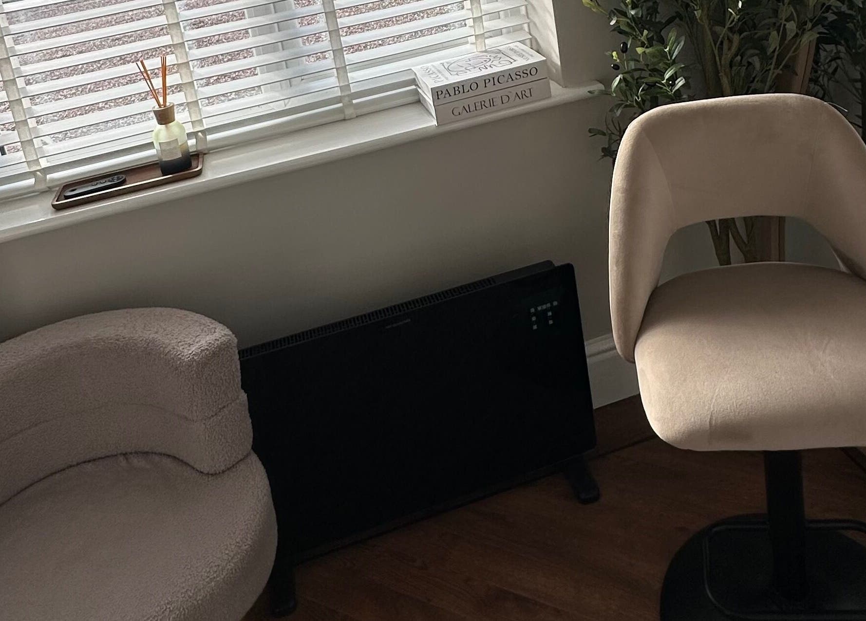 Elegant corner at El Emery Makeup & Beauty, ST21 6JU, England, GB with plush seating and modern décor.